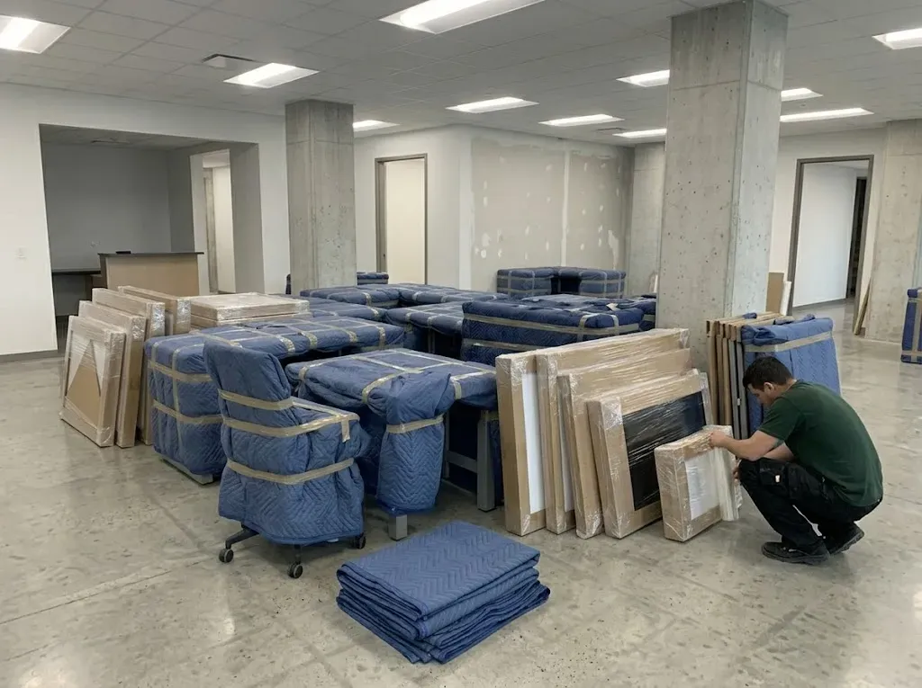 Inventory specialist inspecting and documenting office assets